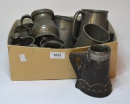 Quantity of various antique pewter measures, tankards and peppers, together with a leather metal