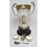 Birmingham silver two-handled trophy cup, 8.5oz t, together with three silver napkin rings and a