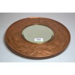 Keswick School of Industrial Arts, circular repousse copper wall mirror, signed W.H. Wilson, 30.