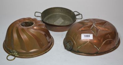 Two copper jelly moulds and two, two-handled copper saucepans