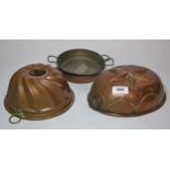 Two copper jelly moulds and two, two-handled copper saucepans