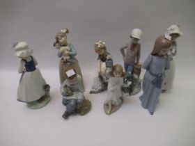 Group of eight Nao figures of children