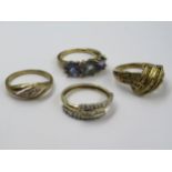 Four various 9ct gold stone set dress rings Combined weight is 7.2g.