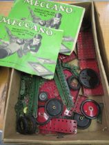 Early Meccano set with two instruction booklets No. 2A and No. 4A