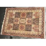 Machine woven Persian design carpet and a Pakistan Bokhara design rug