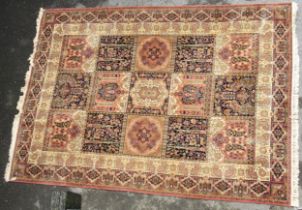 Machine woven Persian design carpet and a Pakistan Bokhara design rug