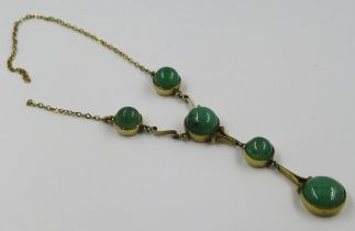 Gold mounted pendant necklace set five cabochon jade stones (chain at fault)