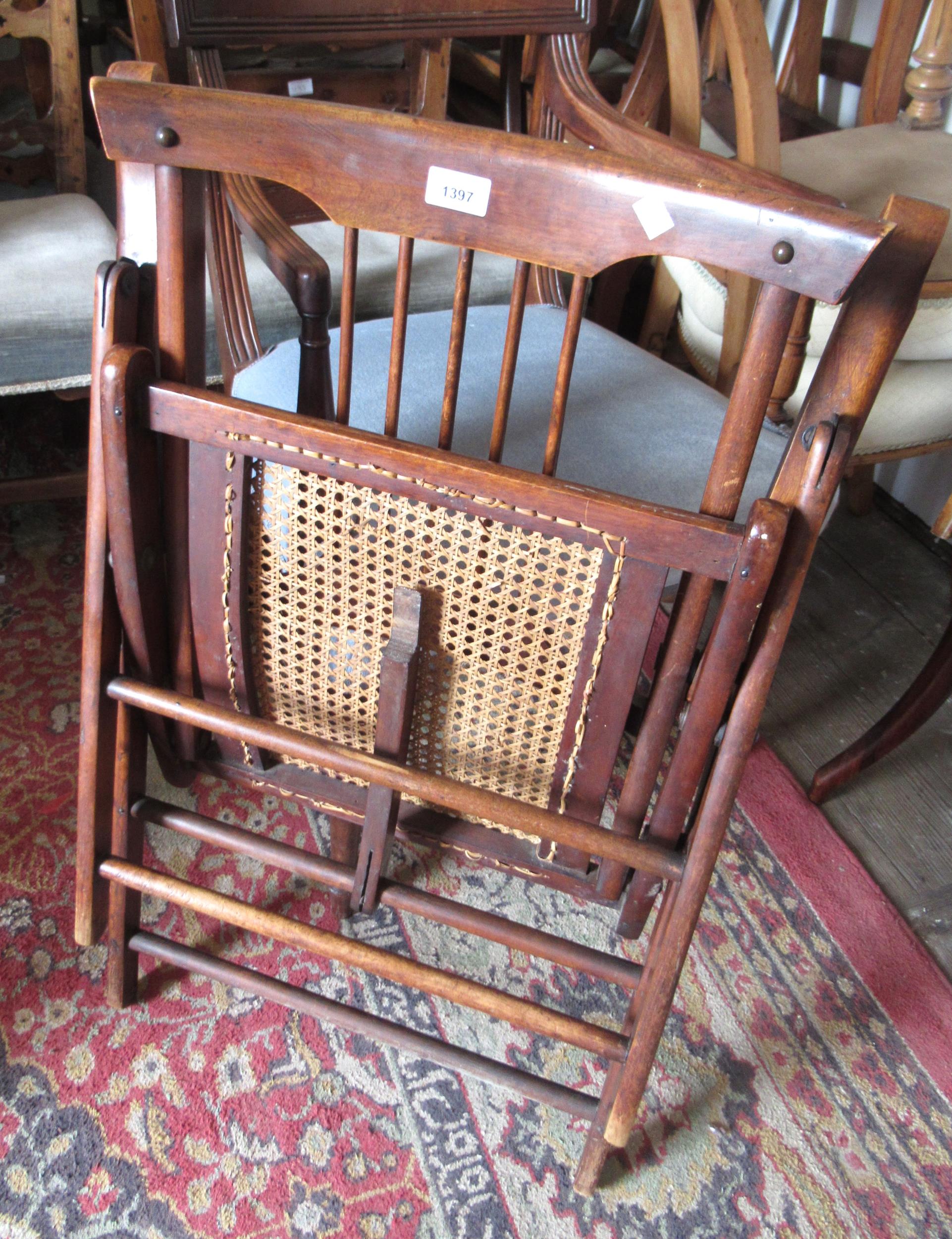 Late 19th / early 20th Century folding campaign chair with a spindle back and cane seat - Image 2 of 2