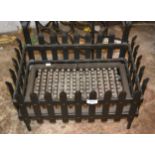 Small 20th Century wrought iron fire grate, 50cm wide