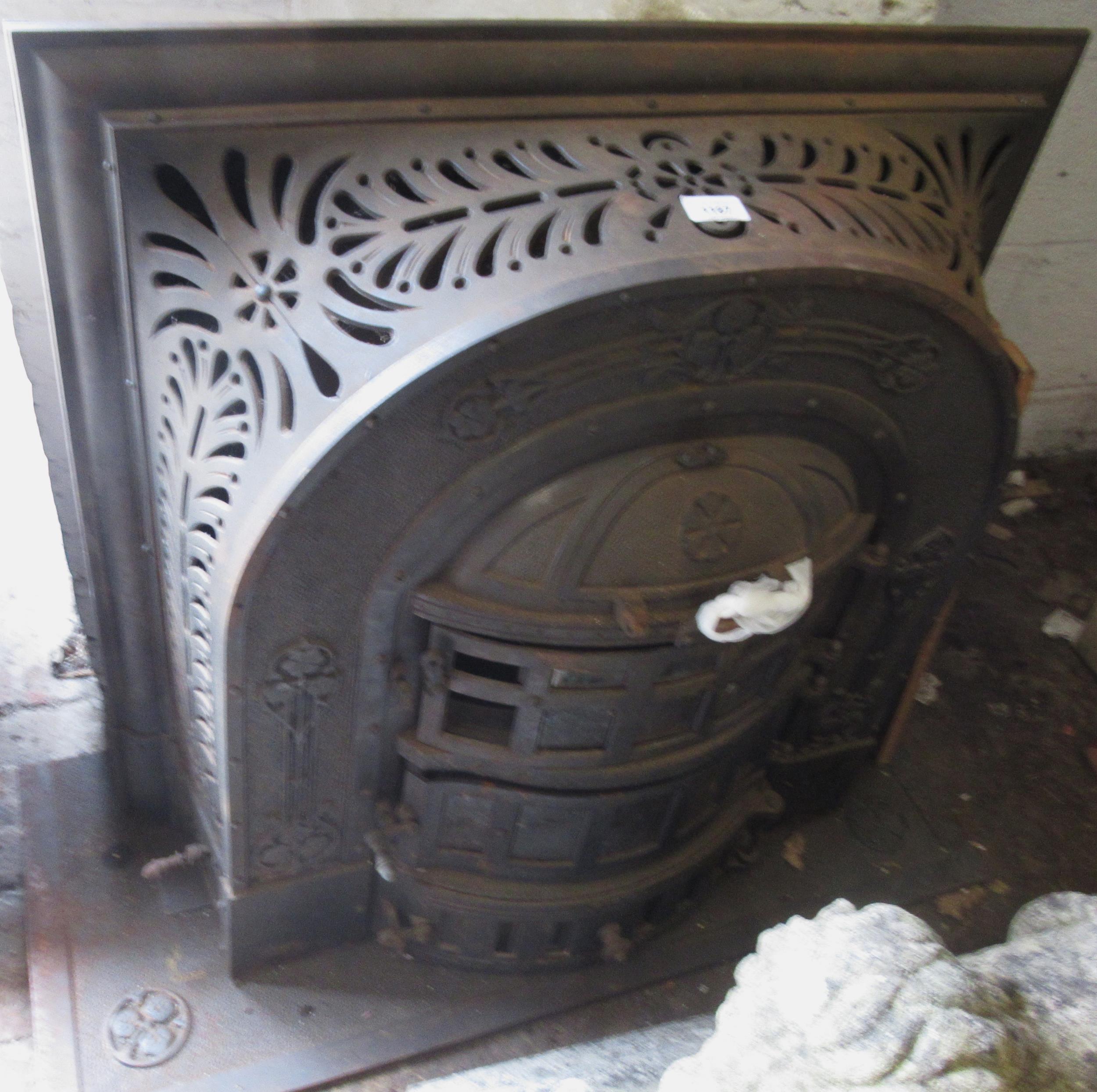 Jan Jaarsma, late 19th Century cast iron stove with relief moulded cast decoration, including base -