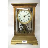 Eureka electric four glass and gilt metal library clock, the enamel dial with Roman numerals, signed