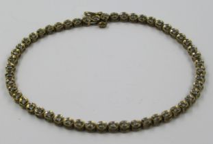 9ct Yellow gold diamond set line bracelet, 5.5g