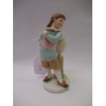 Royal Worcester porcelain figure of a boy leaning against a column with a vase, 17cm high