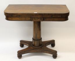 Early 19th Century rosewood D-shaped fold-over card table on turned column and quadruped platform
