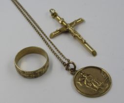 Continental 9ct gold pendant crucifix together with a 9ct gold Saint Christopher pendant on chain