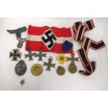 Quantity of German Third Reich badges, medals and medallions, including a Panzer assault badge,