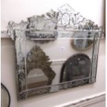 Modern Venetian style rectangular wall mirror with shaped surmount, having etched segmented borders,