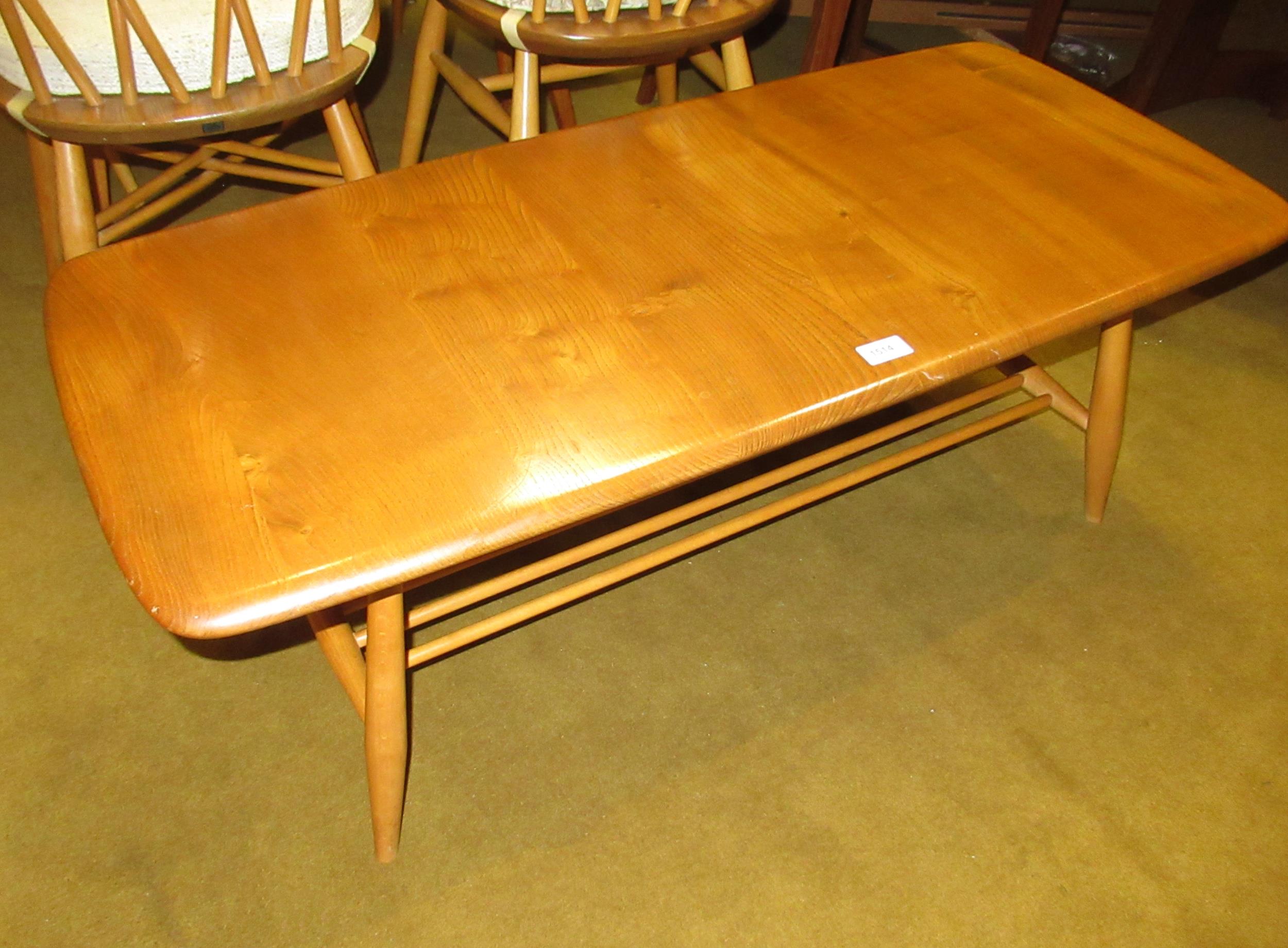 Ercol (unmarked) light ash coffee table, on splayed supports, with undertier, 36cm high x 104cm long