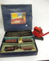 Triang children's pull-along toy crane and a boxed Hornby Meccano 'O' gauge clockwork tin plate