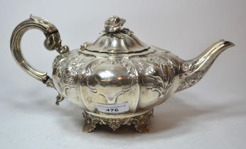 Early Victorian silver teapot of lobed squat baluster form with embossed floral decoration, London