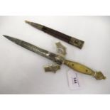 Islamic style Spanish dagger with horn handle and leather scabbard, the blade marked Toledo, 33cm