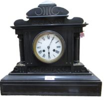 19th Century French black slate mantel clock, the enamel dial with Roman numerals and two train