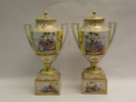 Pair of large Vienna two handled baluster form vases with covers and pedestal bases decorated with