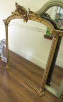 Large 19th Century gilded composition overmantel mirror, the floral and maskhead surmount above an