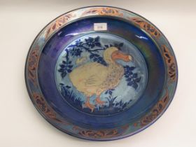 Jonathan Chiswell Jones, large lustre charger decorated with a dodo, signed, 39cm diameter Surface
