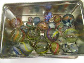 Small quantity of various marbles including large diameter Diameter of largest is approximately 2.