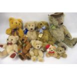 Three Christina Harris original bears having articulated bodies with glass eyes, together with a