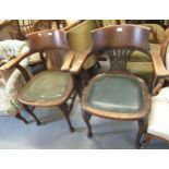 Near pair of 1930's oak open office armchairs on cabriole front supports (at fault)