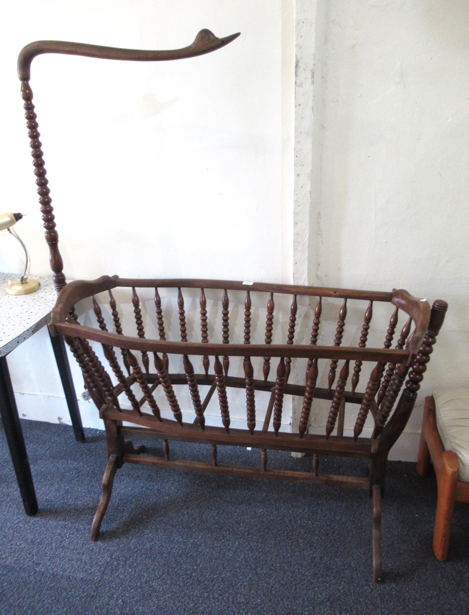 Child's 19th Century Continental rocking crib with bobbin turned decoration, together with late