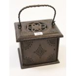 Unusual small antique carved oak box with a pierced top, iron carrying handle and single panel door,