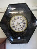 French ebonised and buhl inlaid hexagonal wall clock, the circular marbled dial with gilt and enamel