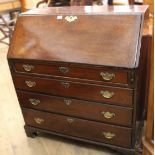 19th Century mahogany bureau, the fall front enclosing a fitted interior with leather writing