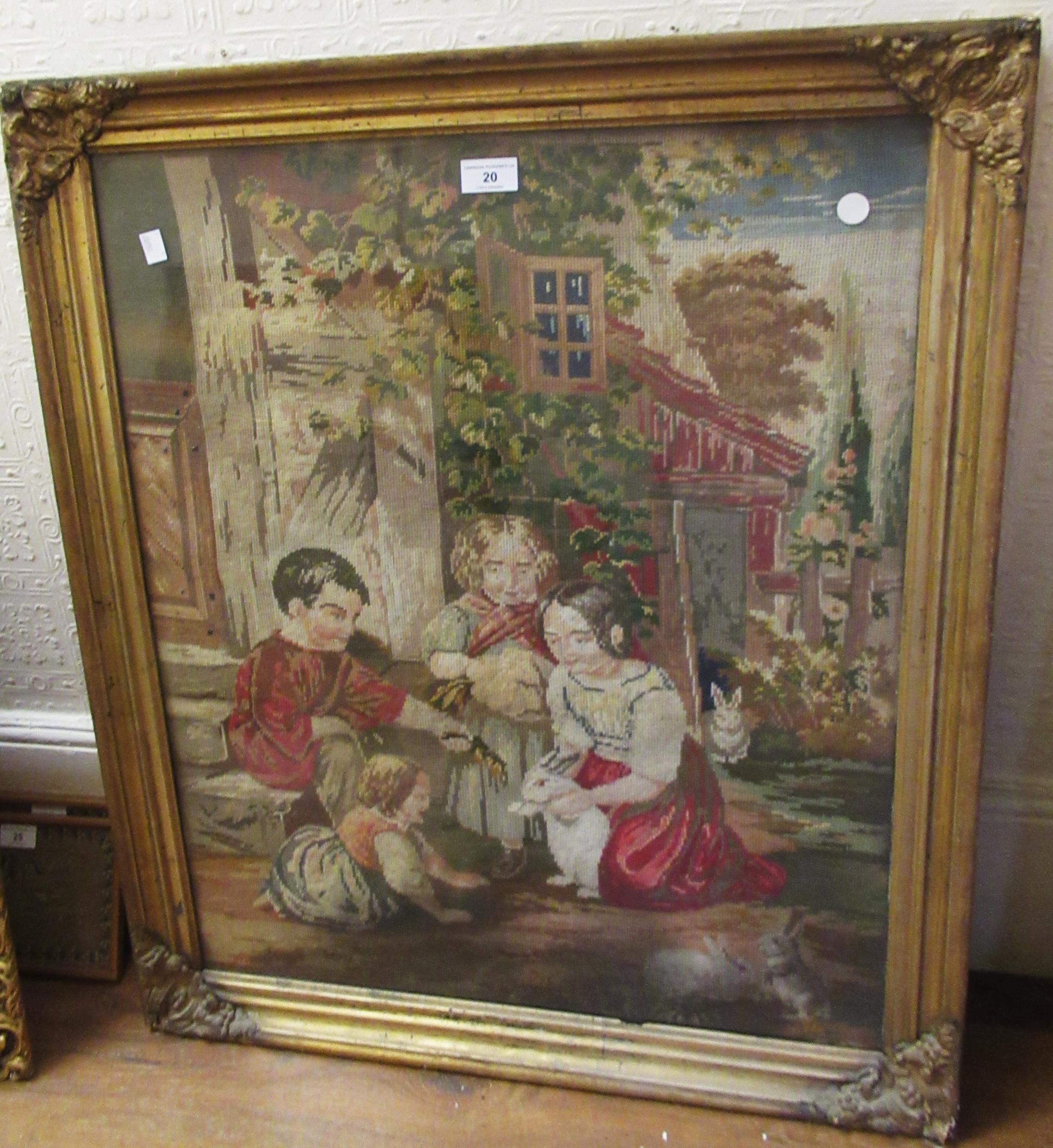 19th Century needlepoint picture of four children playing, gilt frame, 80 x 67cm Some staining as