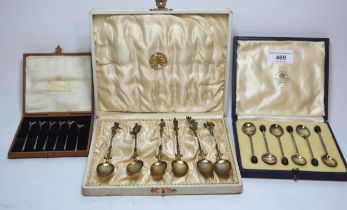 Cased set of six Sheffield silver bean handled coffee spoons, a cased set of six Italian white metal