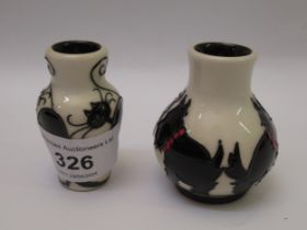 Miniature Moorcroft vase decorated with Scottish terriers, together with a similar vase decorated