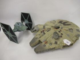 Star Wars model of the Millennium Falcon 1995, together with another Star Wars model