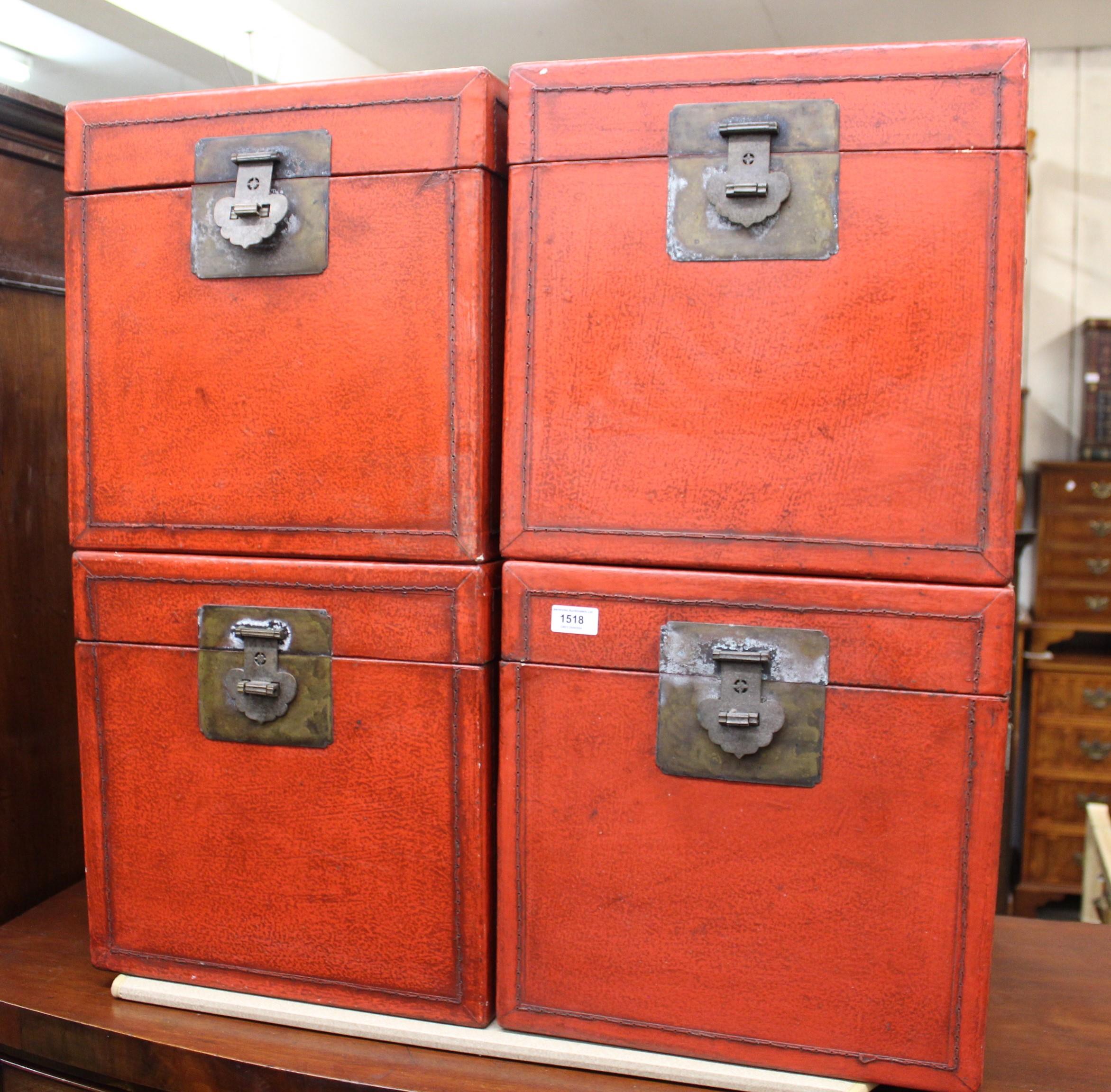 Group of four modern Chinese red lacquer storage boxes, each 40cm wide