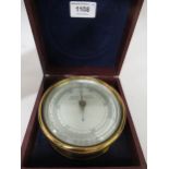Negretti & Zambra, circular gilt brass cased aneroid barometer inscribed ' Mark I ', together with