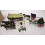 Three Britains farm wagons, including a later carriage and a boy on a swing, unboxed