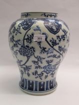 Chinese porcelain baluster form temple jar with blue floral decoration, 33cm high Large firing crack