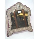 Large silver mounted dressing table mirror with a cartouche shaped bevelled plate and original