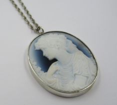 Circular silver mounted glass portrait cameo pendant on a silver chain