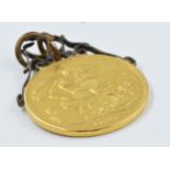 1896 Sovereign in a pendant mount Gross weight 8.5g. Mount appears to be gold plated only.