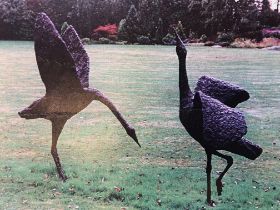 Gail Runyon Perry, pair of large bronzed resin garden sculptures ' Courting Cranes ', 158cm high