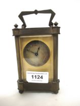 Early 20th Century gilt brass carriage clock, the silvered dial with Arabic numerals, with a