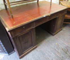 19th Century mahogany partner's desk having an arrangement of nine drawers above panel doors